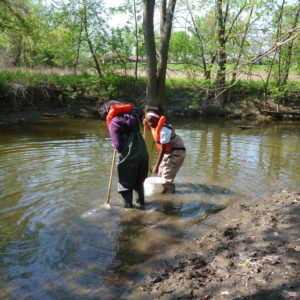 REP Monitoring Parameters Biological - two volunteers collecting water specimens